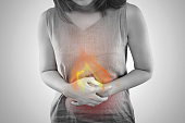 what causes acid reflux in women